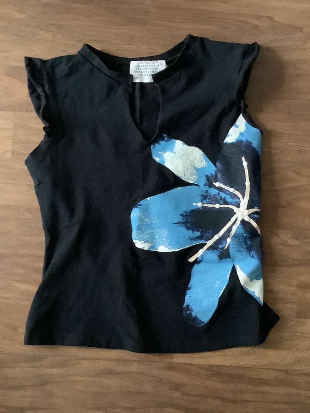 Abcdefgijklm cropped top with orchid flower